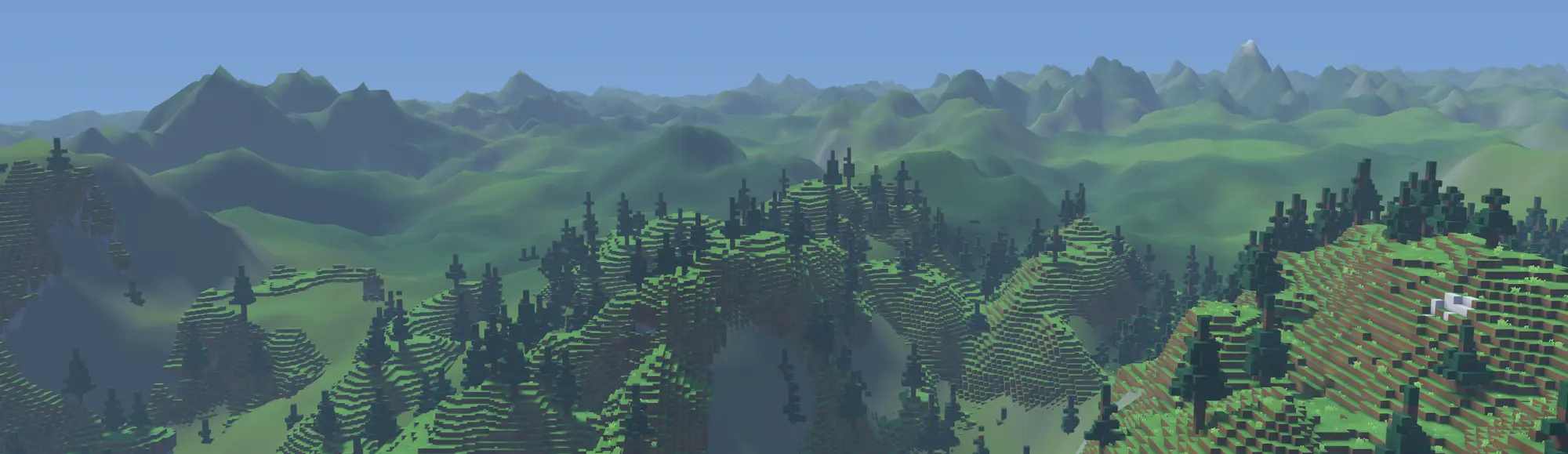 Forested voxel hills in the foreground, and a range of mountains fading into haze on the horizon